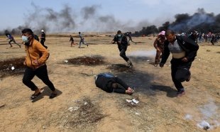 10 imagens da luta dos Palestinos ontem contra mais um forte massacre de Israel